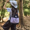 Contrast drawstring backpack in black and lavender for hiking and outdoor travel gear - Black & Purple