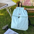 Light blue nylon drawstring backpack with contrast detail for travel and hiking - Blue