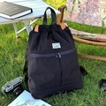 Black casual drawstring backpack with a large capacity and water-resistant nylon fabric - Black
