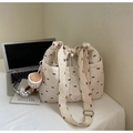 Detail of light beige floral tote with red bow pattern, drawstring and heart charm - Beige With Charm