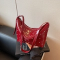 Fashionable dark red glossy crescent bag with silver stud rivets and adjustable strap - Burgundy