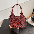 Fashionable red leopard print handbag with glossy texture and knotted handles - Red