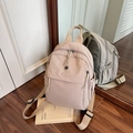 Minimalist lightweight travel backpack for women in apricot pink with multi-pocket design - Khaki