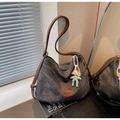 Dark gray vintage tote bag with brown leather straps and colorful cartoon doll charm - Blackish Green With Pendant