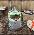 Detail of lightweight green outdoor backpack showing Gorpcore design and mesh side pockets - Green