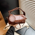 Vintage dark brown oil wax leather pillow handbag with silver metal hardware and adjustable strap - Brown