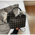 Close-up of a plaid tote bag with pearl pendant and lace ribbon on a white background - Black with Pendant