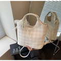 Detail of checkered tote bag featuring lace trim and a decorative pearl bow charm - Cream White With Pendant