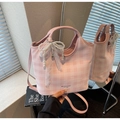 Close-up of pink checkered tote bag featuring a pearl bow and lace ribbon pendant - Pink with Pendant