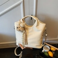 Creamy white crocodile embossed bucket bag with a cute bear plush charm and strap - White with Pendant