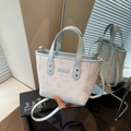 Light blue bucket bag with white deer pattern print and detachable shoulder strap - Blue