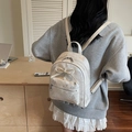 Mini zaino in pelle avorio con goffratura a farfalla, fiocco e ciondolo con perla - Bianco Riso Grande
