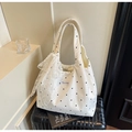 White floral canvas tote bag with lace bow decoration and magnetic closure on luggage - Off-white