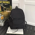 Minimalist black outdoor backpack featuring functional elastic cords and waterproof fabric - Large / Black