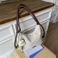 Beige canvas tote bag with dark brown leather straps and yellow moon plush charm - Coffee with Pendant