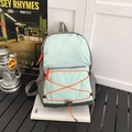 Light blue and grey waterproof nylon backpack featuring orange elastic cords and zippers - Large / Green