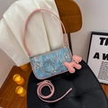 Blue denim sequin underarm bag with pink leather strap and poodle charm accessory - Pink