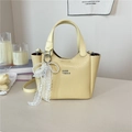 Chic cream yellow bucket bag with cracked texture and pearl lace bow accessory - Yellow with Pendant