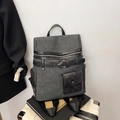 Zaino in tela grigia con tasche in pelle nera e fibbia in metallo da donna - Nero