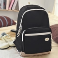 Sac à dos minimaliste en tissu noir et beige au design bicolore pour le voyage - Noir