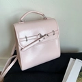 Fashionable light pink faux leather backpack with silver hardware and ring buckle - Pink