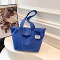 Minimalist large-capacity canvas tote bag in vibrant Klein Blue with front flap pocket - Blue
