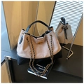 Detail of khaki suede and black quilted leather tote bag with gold chain and twist lock - Khaki