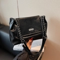 Black glossy leather shoulder bag with silver chain strap and metal logo plaque detail - Black