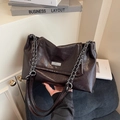 Dark brown large tote bag with glossy wrinkled texture and silver chain strap details - Coffee