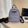 Blue striped mini backpack with black heart patterns and decorative bow detail - Black Heart