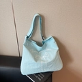Light blue canvas tote bag with bow print and adjustable shoulder strap for daily use - Light Blue