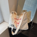 Beige large canvas tote bag with red bow print and Protect your Heart slogan - Off White