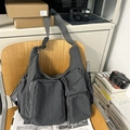 Modern dark grey multi-pocket techwear crossbody bag with adjustable wide shoulder strap - Gray