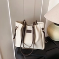 Chic off-white large capacity tote bag with dark brown straps and brand logo patch - Off White