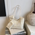 Gelb und weiß gestreifte Canvas-Einkaufstasche mit kleiner Tasche auf Reisekoffer - Gelb