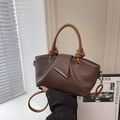 Dark brown lychee pattern tote bag with light coffee handles and silver hardware - Brown