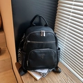 Chic black lychee grain leather mini backpack with geometric patterned strap detail - Black