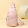 Pink crossbody chest bag with adjustable zigzag strap and multiple zipper pockets - Pink