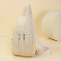 Creamy beige crossbody chest bag featuring a vintage geometric wide woven shoulder strap - Off White
