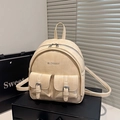 Beige mini backpack in glossy wrinkled faux leather with metallic buckles and front pockets - Khaki