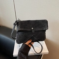 Black denim crossbody bag with adjustable strap and vintage quilted V-stitching - Black