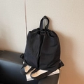 Sac à dos noir léger en nylon à cordon avec poignée renforcée et étiquette tissée - Noir