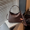 Minimalist dark brown pebble leather handbag with adjustable strap for women - Brown