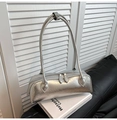 Detail of silver metallic wrinkled leather handbag featuring top handles and zipper closure - Silver