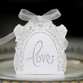 Elegant white laser-cut LOVE candy gift box with hollow rose patterns and ribbon bow - White