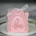 Pink laser cut paper gift box with LOVE text and rose pattern with a ribbon bow - Pink