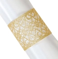 Macro shot of gold glitter laser-cut napkin ring with intricate European vine patterns - Glitter Golden Yellow