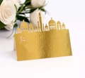 Dettaglio del segnaposto dorato tagliato al laser con decoro islamico e motivo a stella - Oro Riflettente