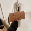 Minimalist brown leather crossbody square bag featuring diagonal stitching and metal buckle - Khaki