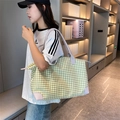 Grand sac de voyage avec motif pied-de-poule vert et poignées en cuir violet - Vert